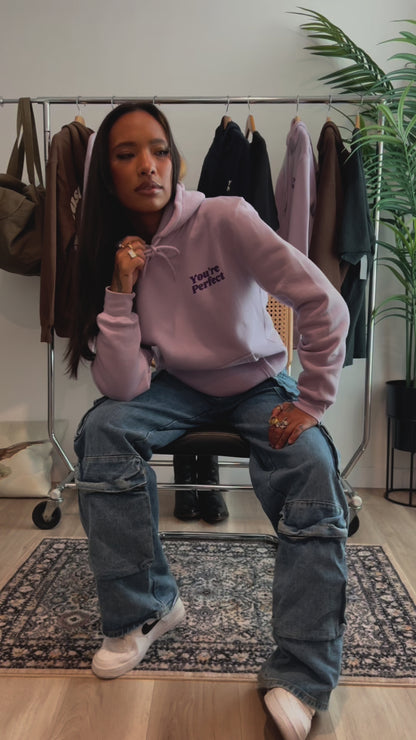 Lilac hoodie on model wearing size small