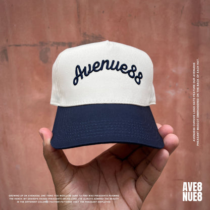 Cream & Navy blue cursive logo hat